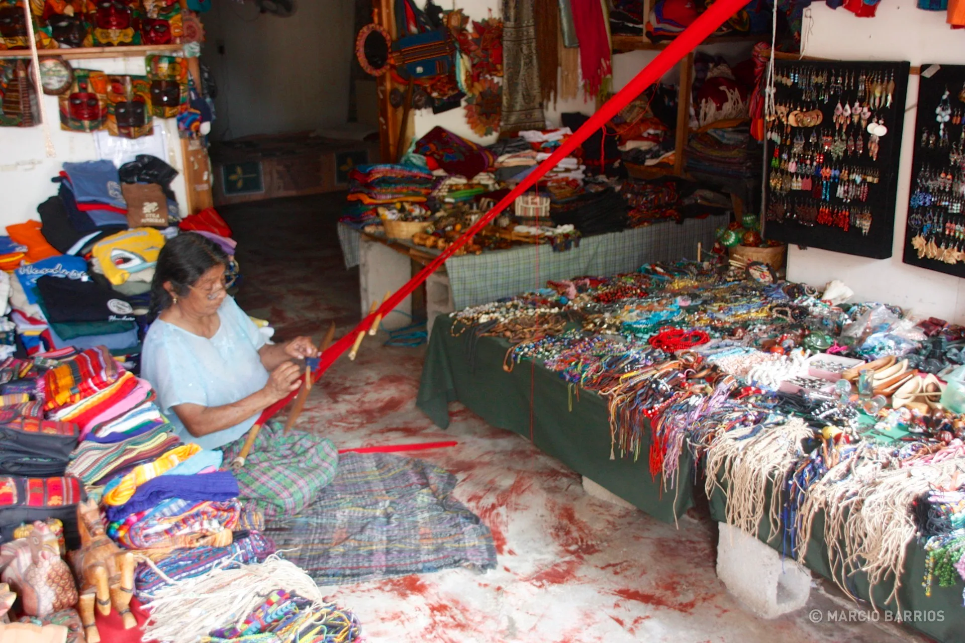 Utila woman weaving in her shop Utila woman weaving in her shop