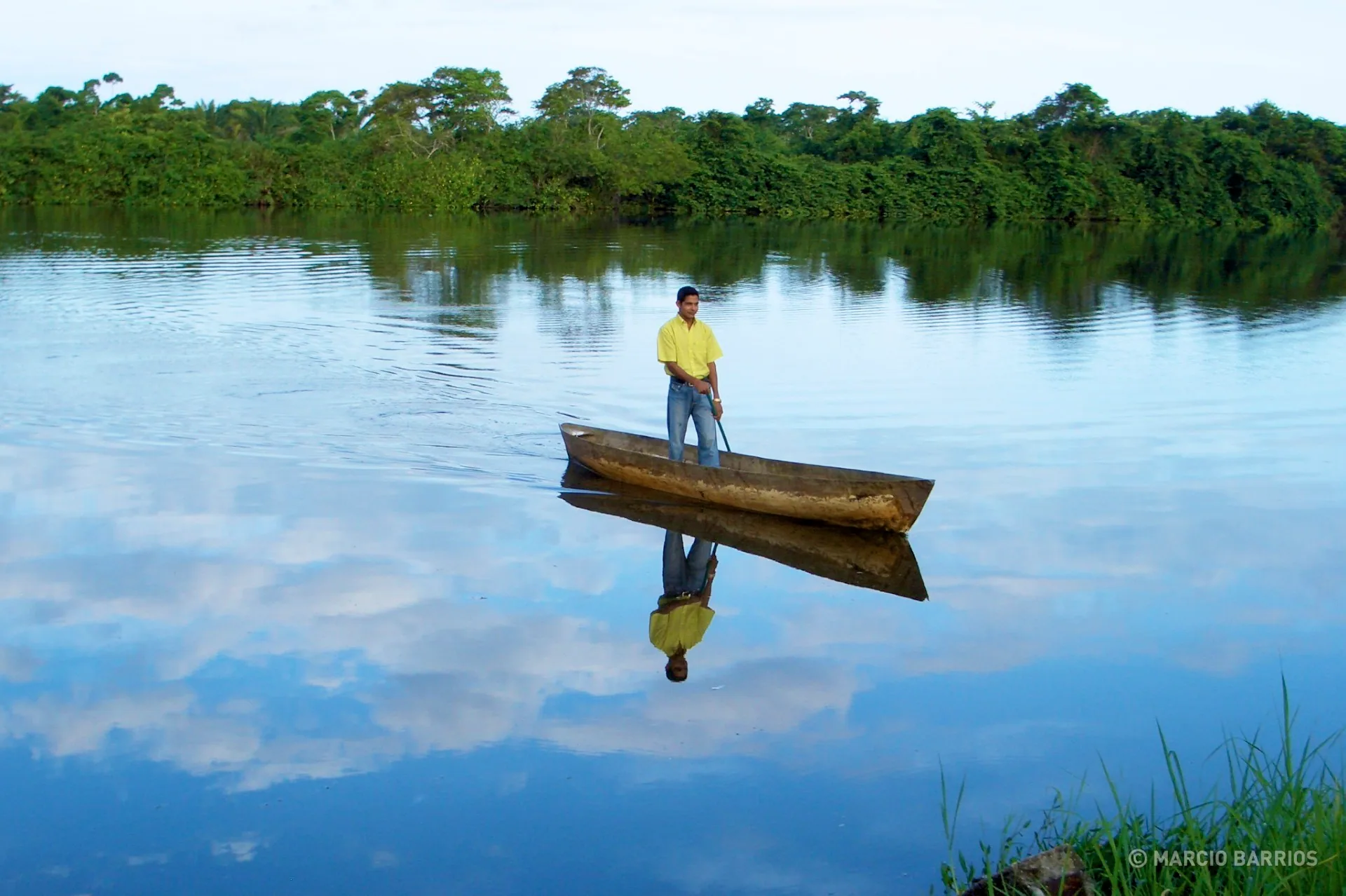 One of the local guides with a canoe One of the local guides with a canoe